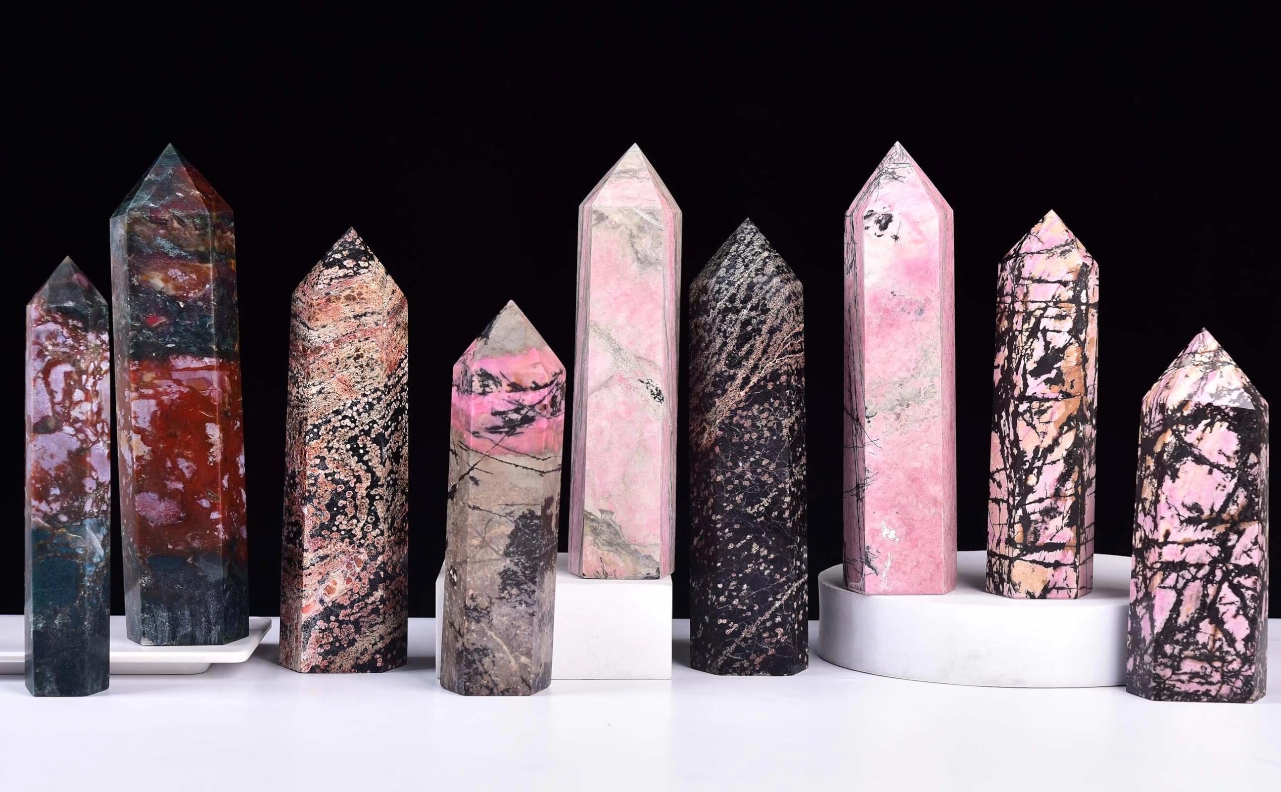 Meditation setup featuring VIZYTOU Rhodonite tower obelisk for serene space