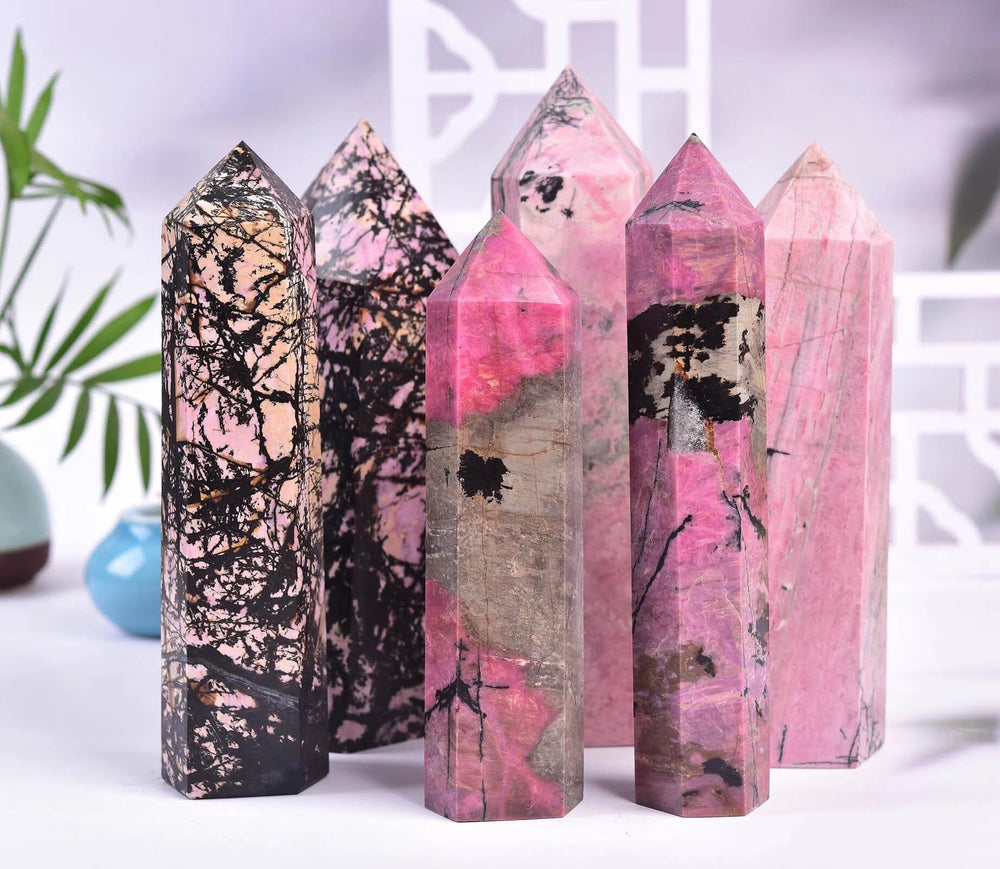 VIZYTOU Rhodonite obelisk on office desk adds calm aesthetic