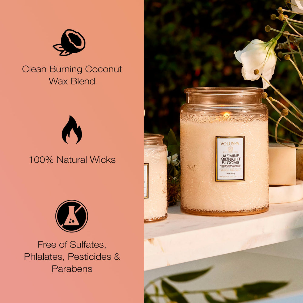 Voluspa Japonica Jasmine Midnight Blooms lit candle creating inviting ambience