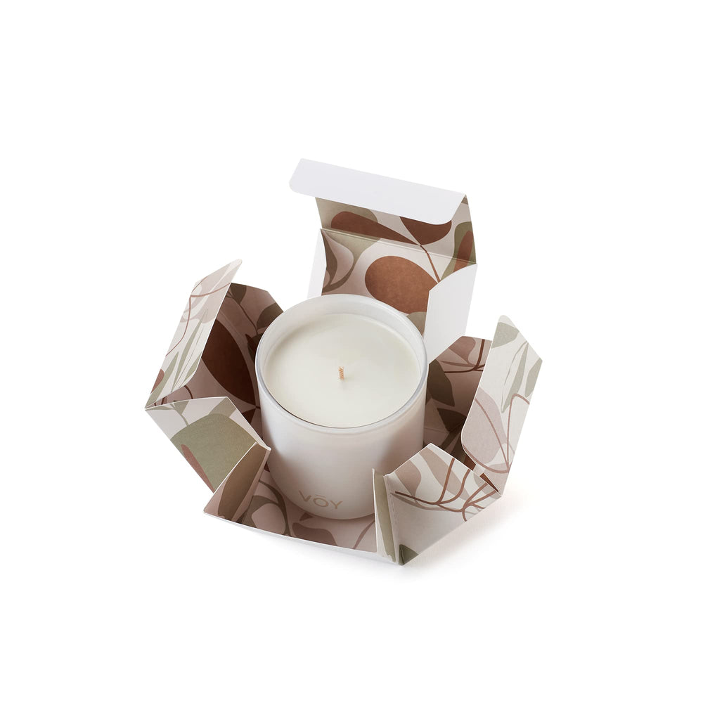 VOY scented candle 8oz jar on wood table ready for cozy evenings
