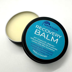 Wavetools Therapy recovery balm tin close-up for massage sessions.