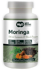 Moringa-turmeric tablets close-up highlighting plant-based formula