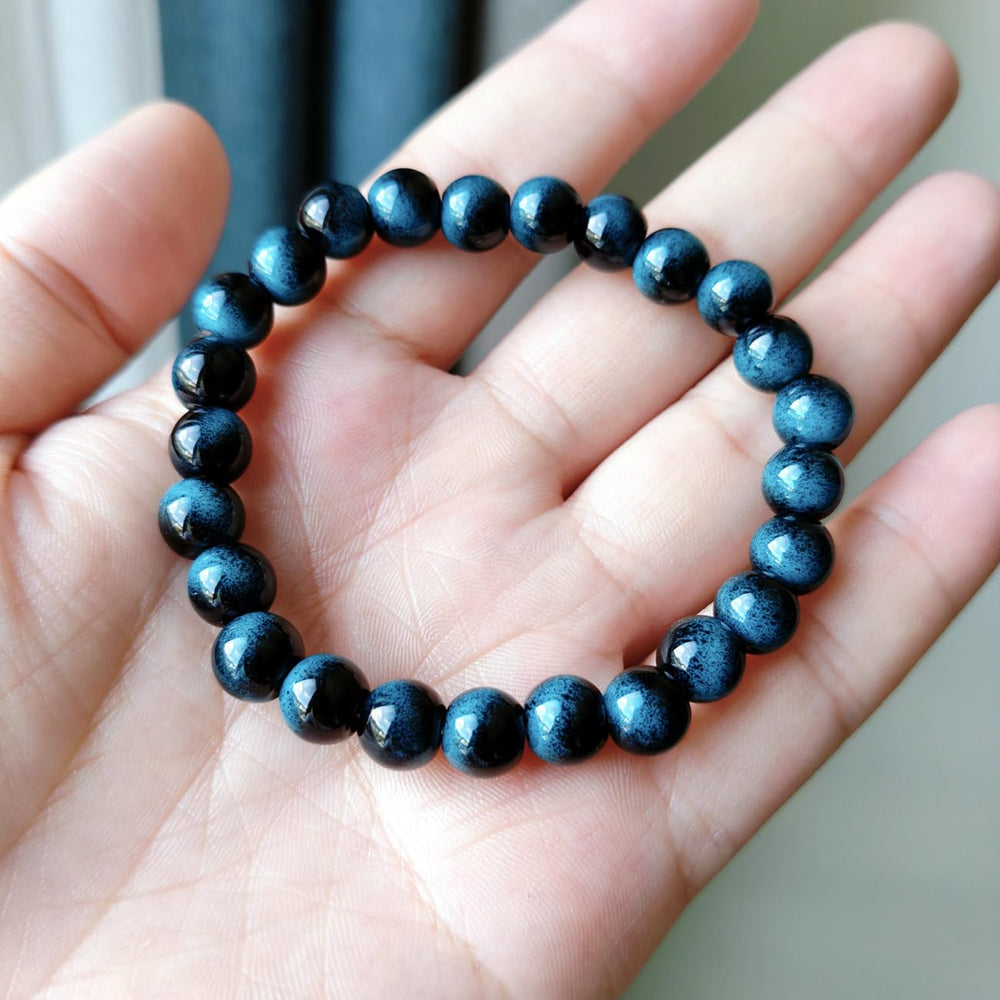 WEFRIN Evil Eye bracelet bead close-up reveals natural stone textures.