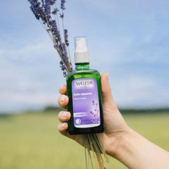 Weleda Relaxing Lavender Body Oil massage scene conveying relaxation after a long day.