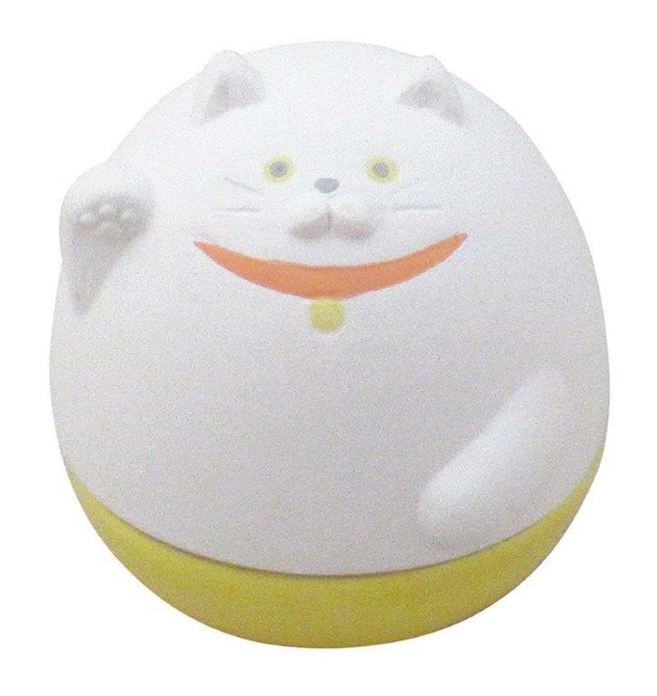 Well Origin stone diffuser with swinging cat on desk for subtle aroma.