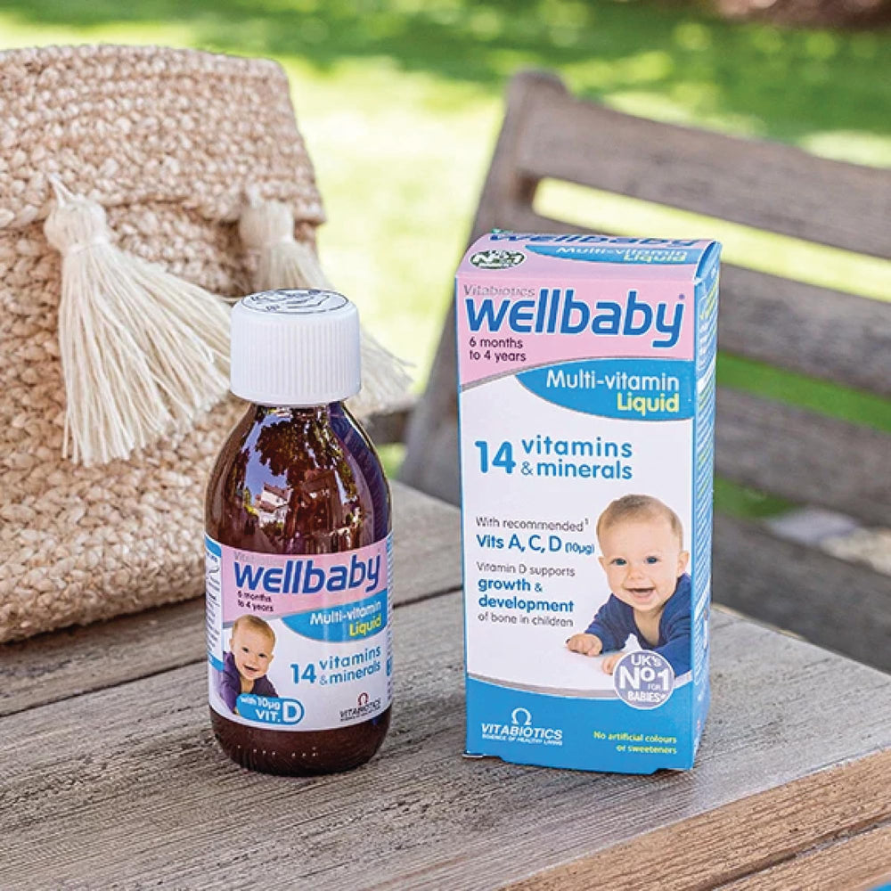 Wellbaby Multi-Vitamin Liquid ingredient label highlighting 14 essential nutrients.