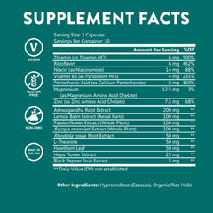 Pill bottle label close-up highlighting vegan, gluten-free features.