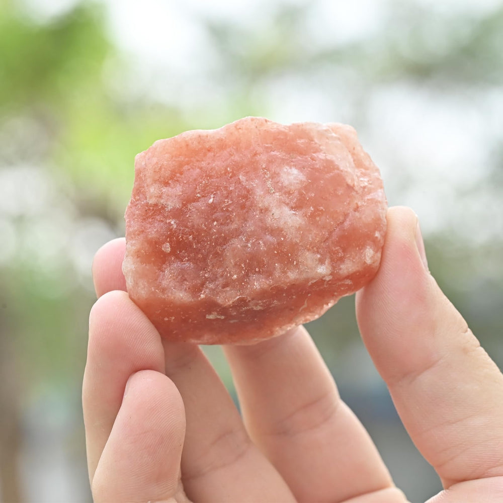 WHAL&YUNE orange salt raw stone, natural facets catch light, perfect as a mantel centerpiece.