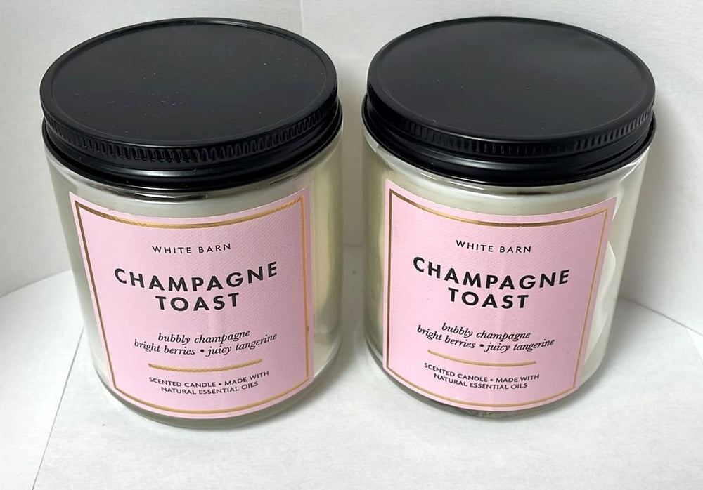 White Barn Champagne Toast candle packaging display shows the 2-pack for cozy gatherings.