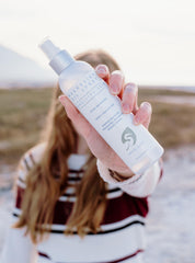White Egret magnesium oil spray in action for quick relaxation and skin hydration.