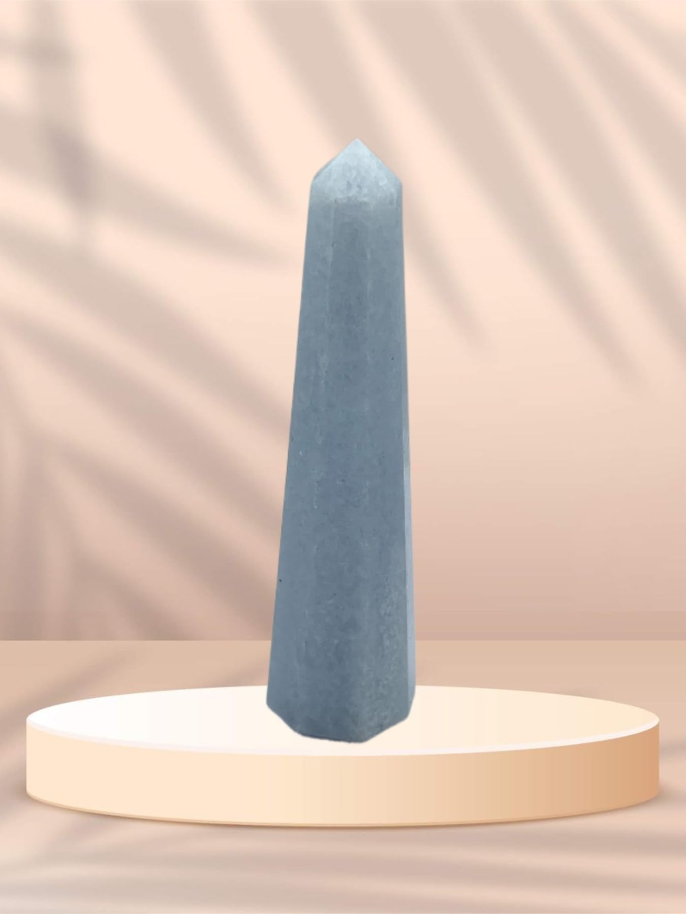Wholesale Gem Shop Blue Calcite Obelisk with detailed facets for mindful meditation.