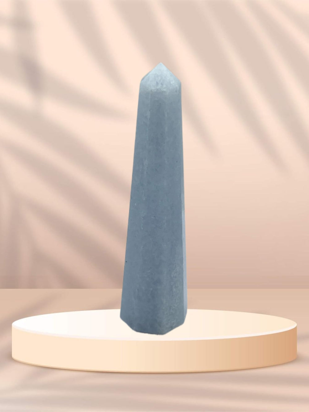 Wholesale Gem Shop Blue Calcite Obelisk with detailed facets for mindful meditation.
