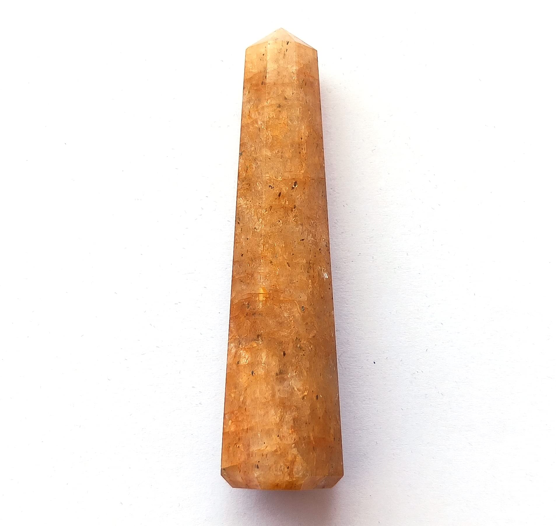 Wholesale Gem Shop Hand-carved obelisk showcases natural texture.