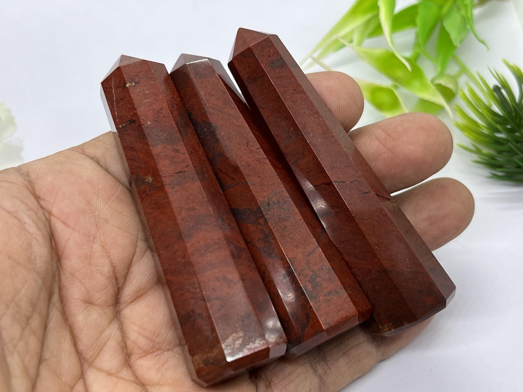 Wholesale Gem Shop red jasper obelisk 70mm side detail emphasizes natural veining and protective symbolism