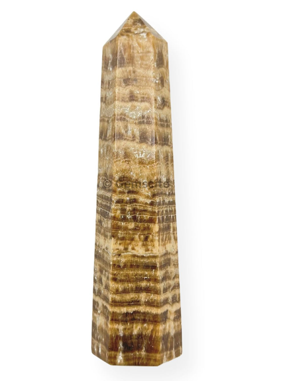 Wholesale Gem Shop aragonite obelisk with facets enhances meditation and altar display