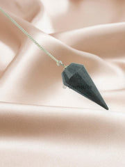 Close-up of 12-facet blue aventurine pendulum bead detail for tactile feedback