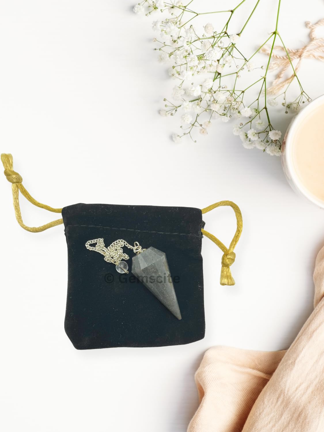 Textured blue aventurine pendulum bead showing natural inclusions