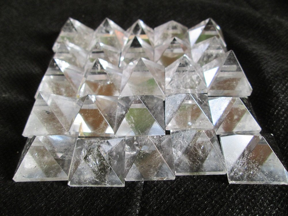 Wholesale Gem Shop clear quartz pyramid for meditation and calming ambiance.