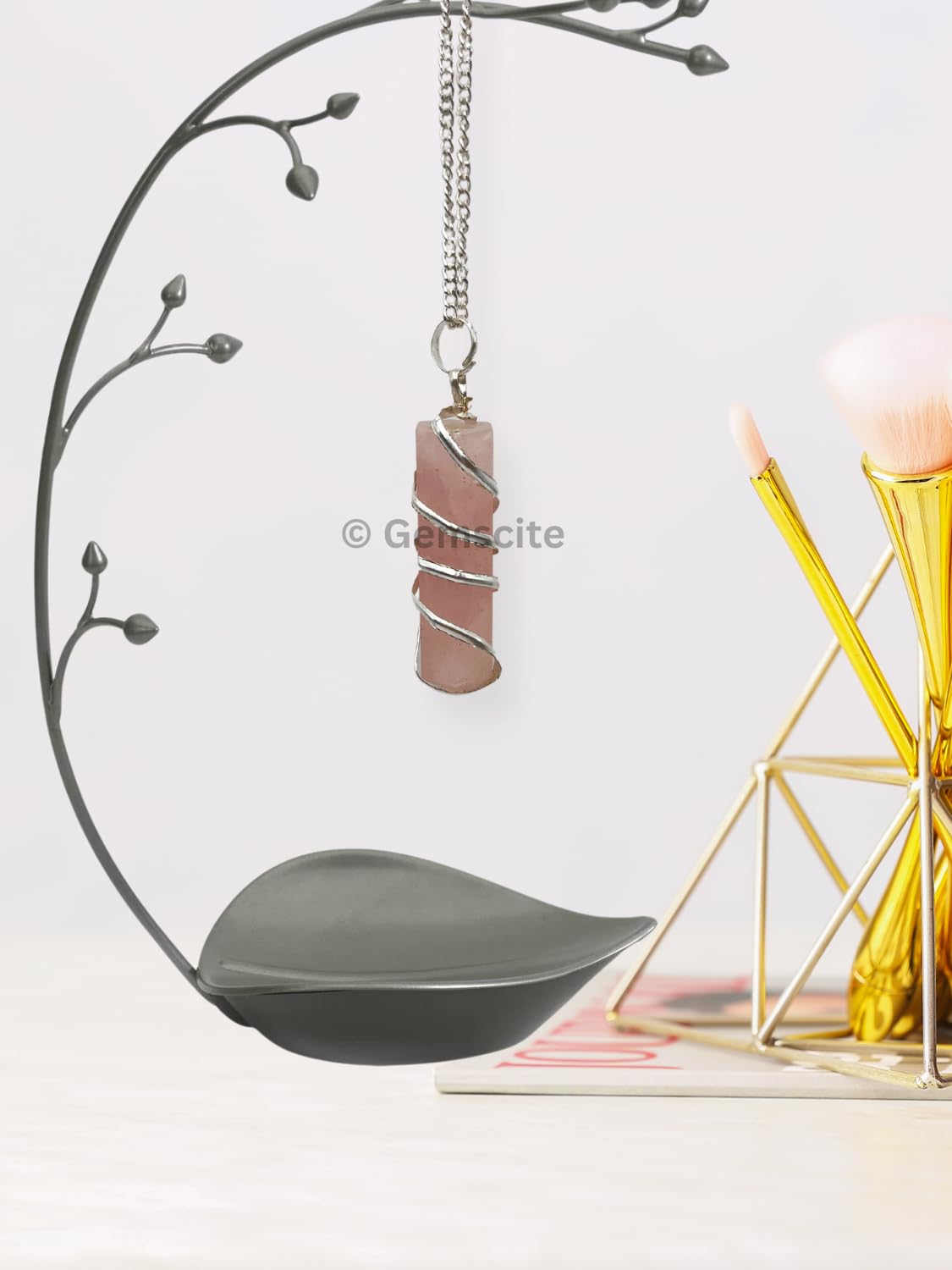 Wholesale Gem Shop closeup of the crystal point pendant revealing facets