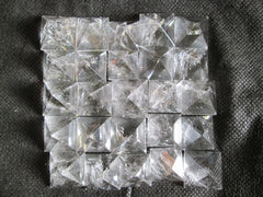 Wholesale Gem Shop crystal quartz pyramid set 12x16mm for focus and energy rituals.