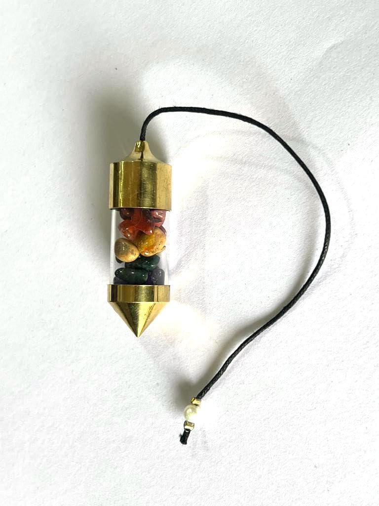 Wholesale Gem Shop brass pendulum in use during a readings session