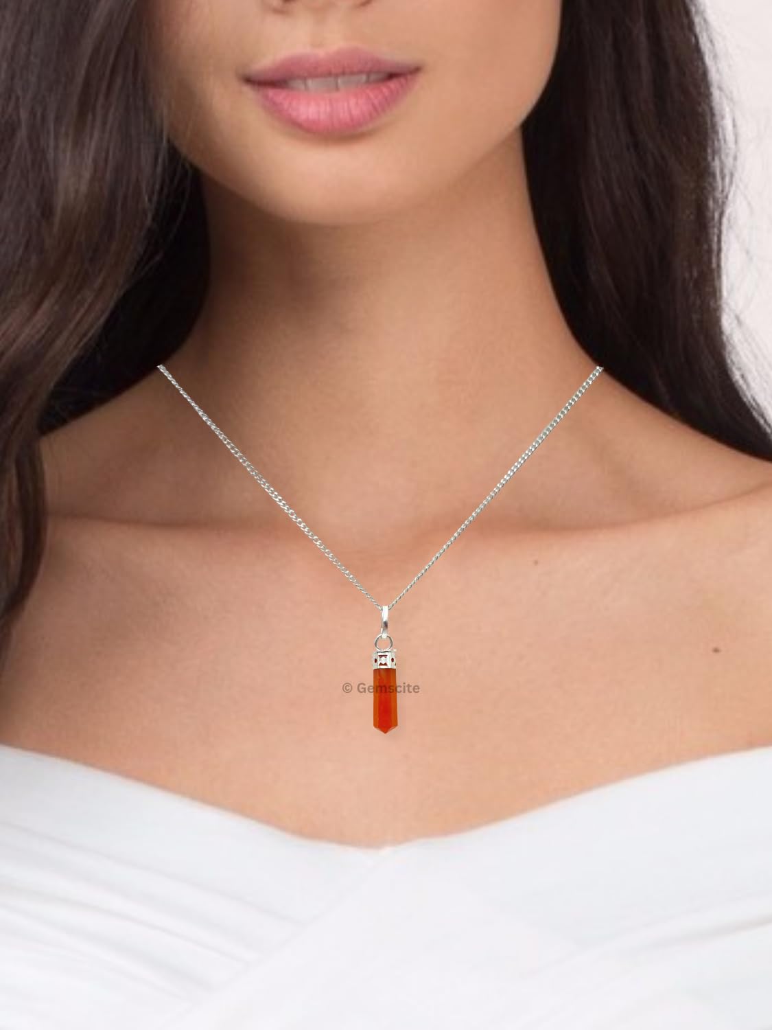Gemscite pendant features chakra-connected crystals to promote balanced energy