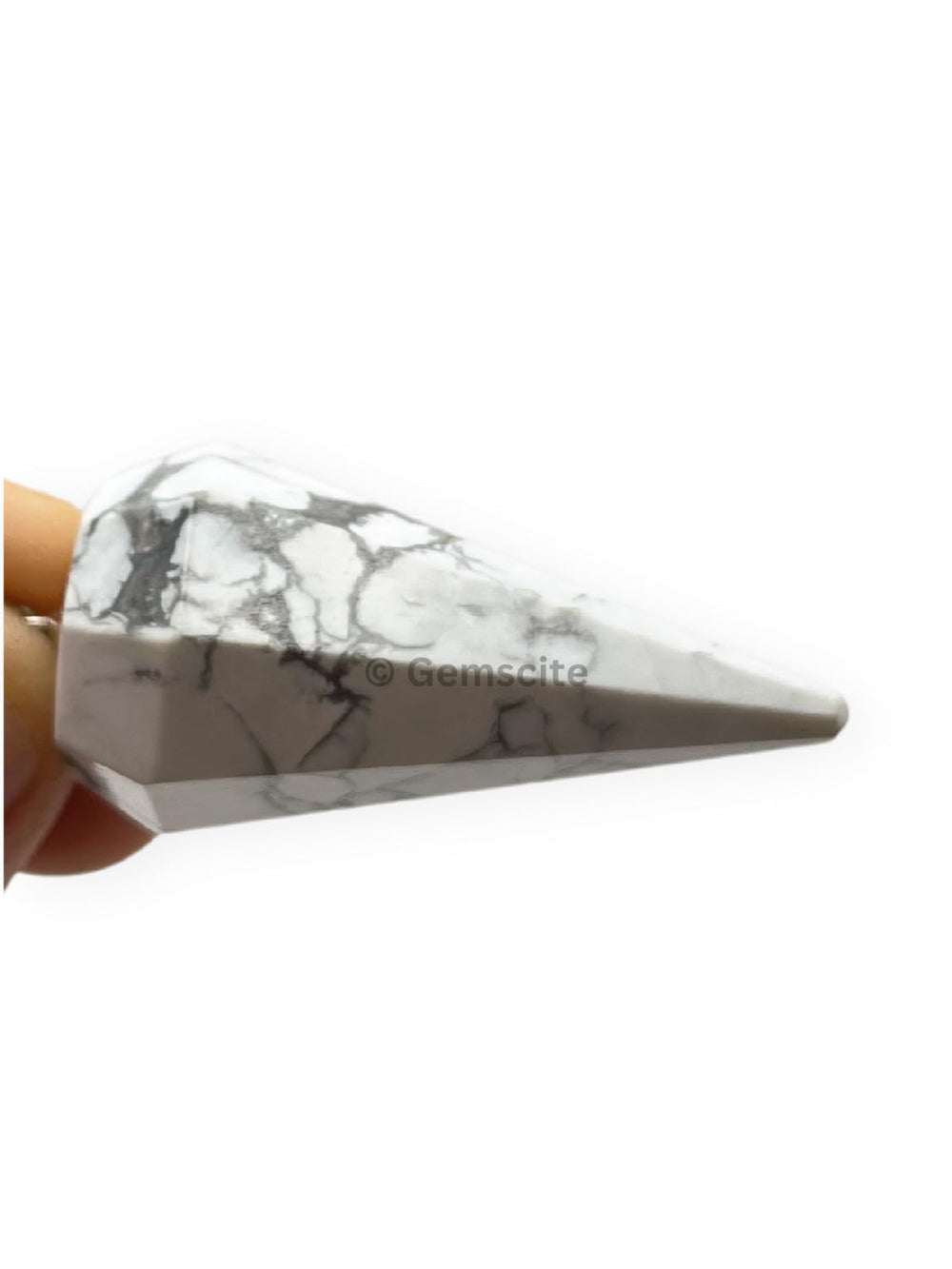 WholesaleGemShop Howlite pendulum closeup reveals natural veining and texture.