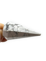 WholesaleGemShop Howlite pendulum closeup reveals natural veining and texture.