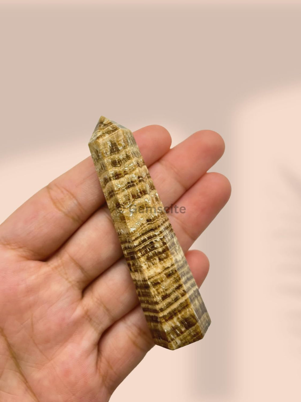 Wholesale Gem Shop aragonite obelisk showcases natural color variations for unique spiritual accents