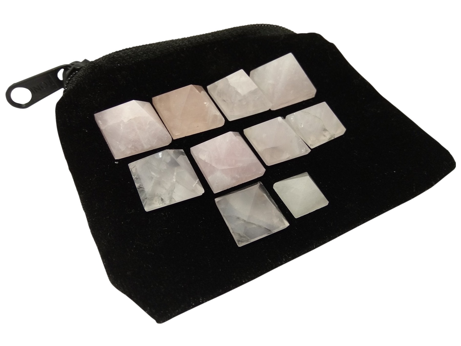 Wholesale Gem Shop rose quartz pyramid color and facets invite serene atmosphere.