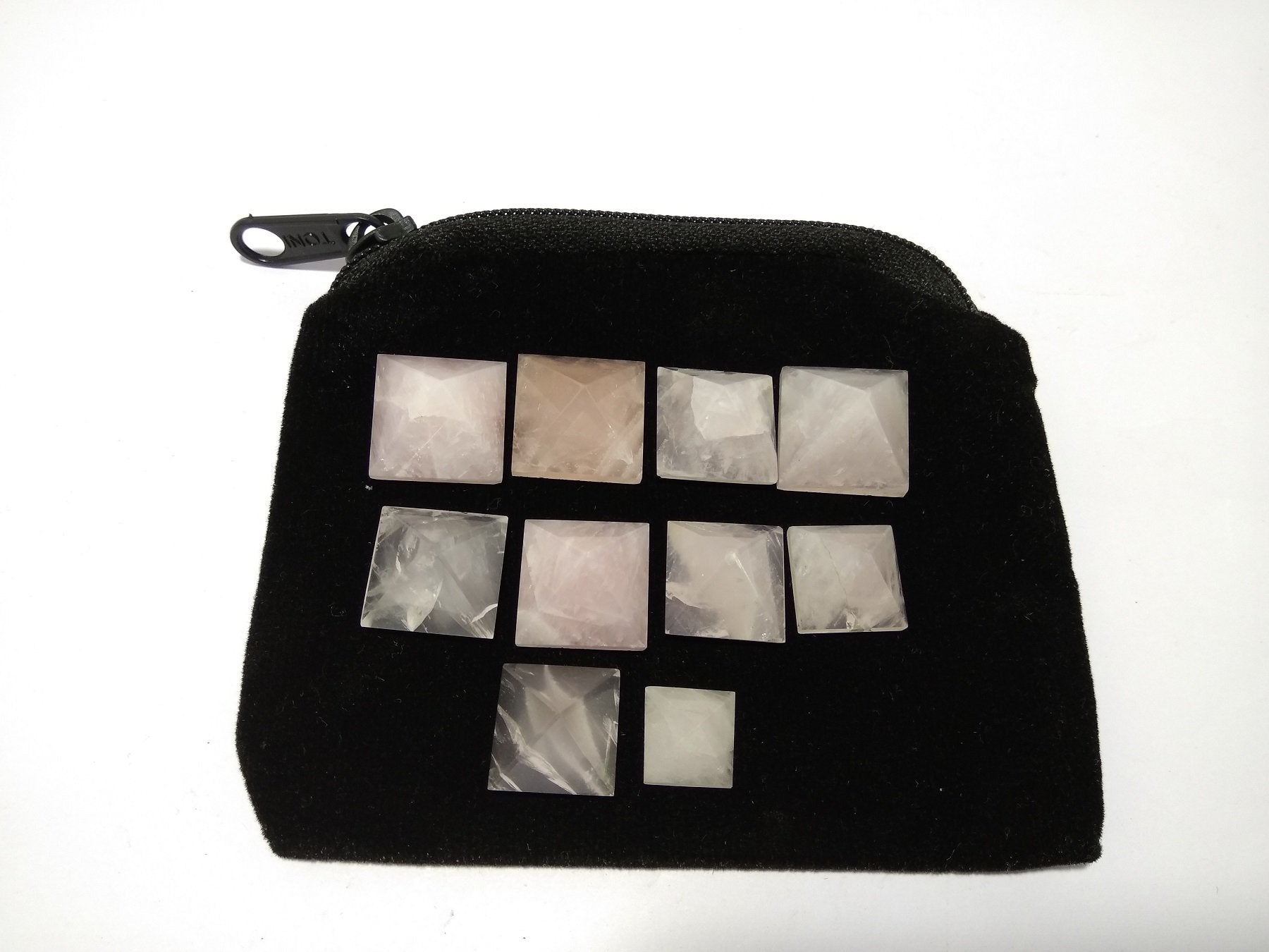 Wholesale Gem Shop rose quartz pyramid fits in compact meditation setups.