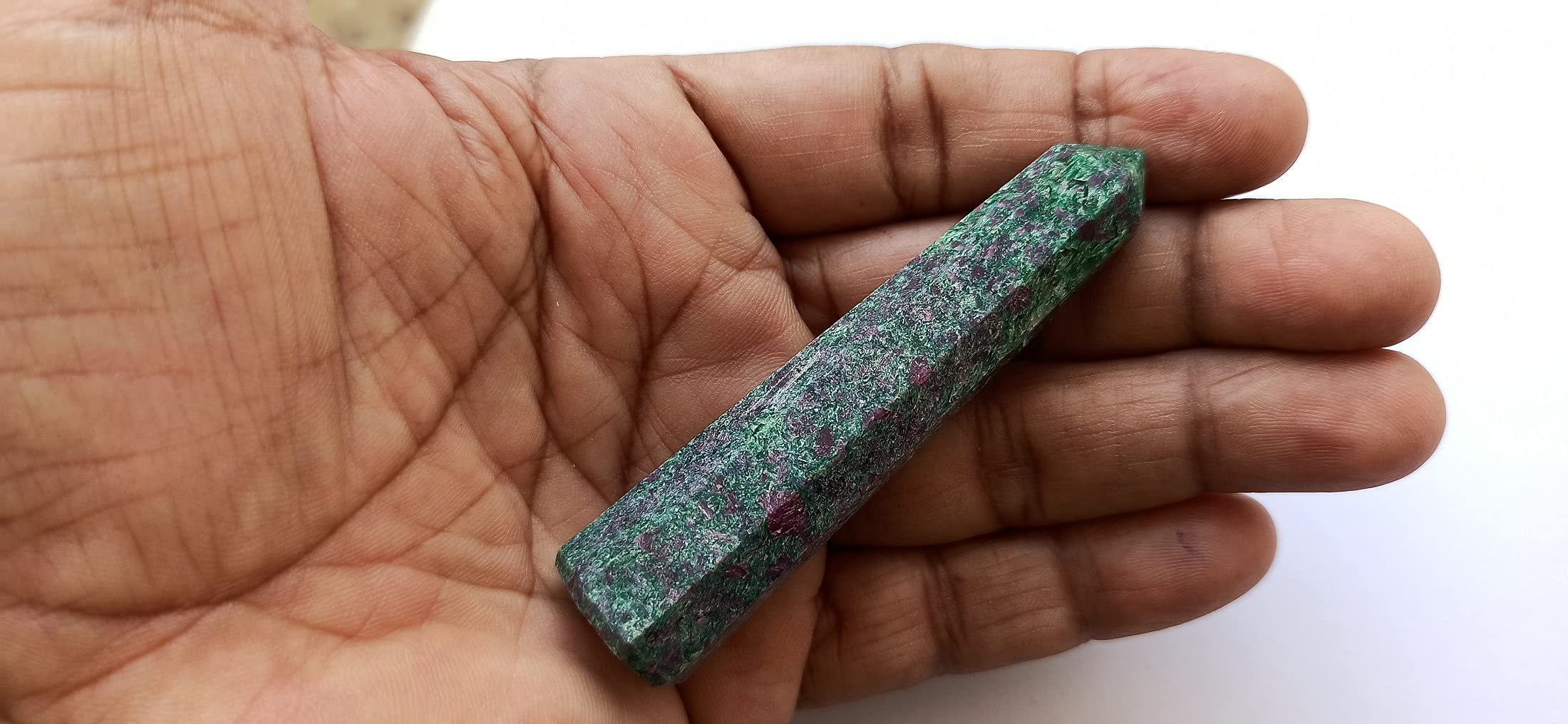 Wholesale Gem Shop ruby zoisite obelisk facet detail showing hand-carved facets