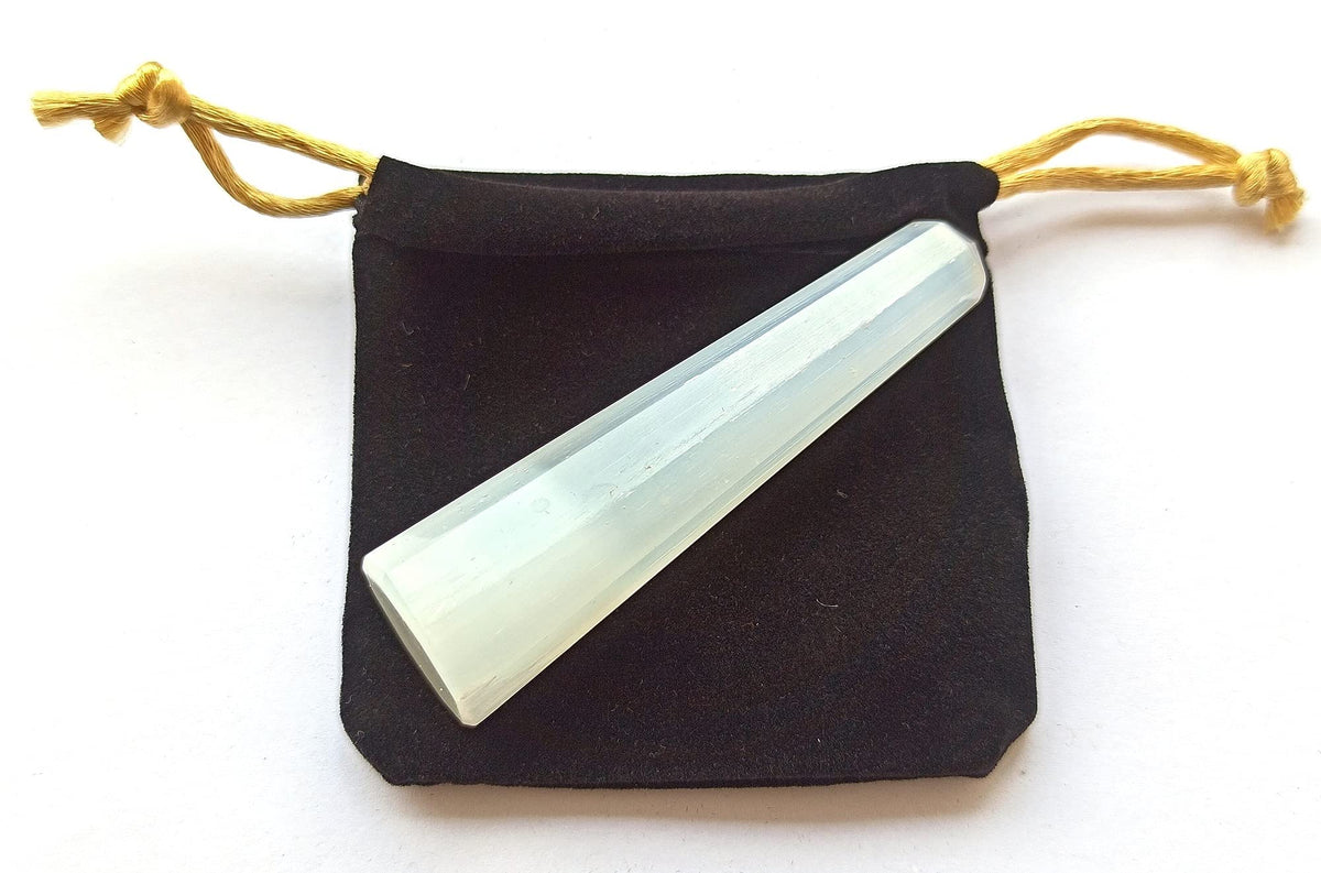 Wholesale Gem Shop selenite obelisk 70mm front view enhances calm energy in your space.