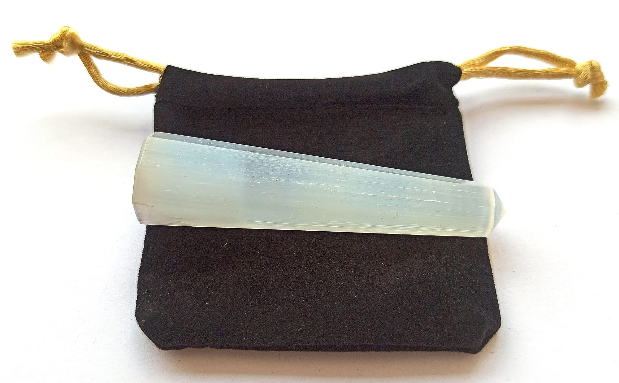 Wholesale Gem Shop selenite obelisk 70mm mid-section shows layered clarity for mindful focus.
