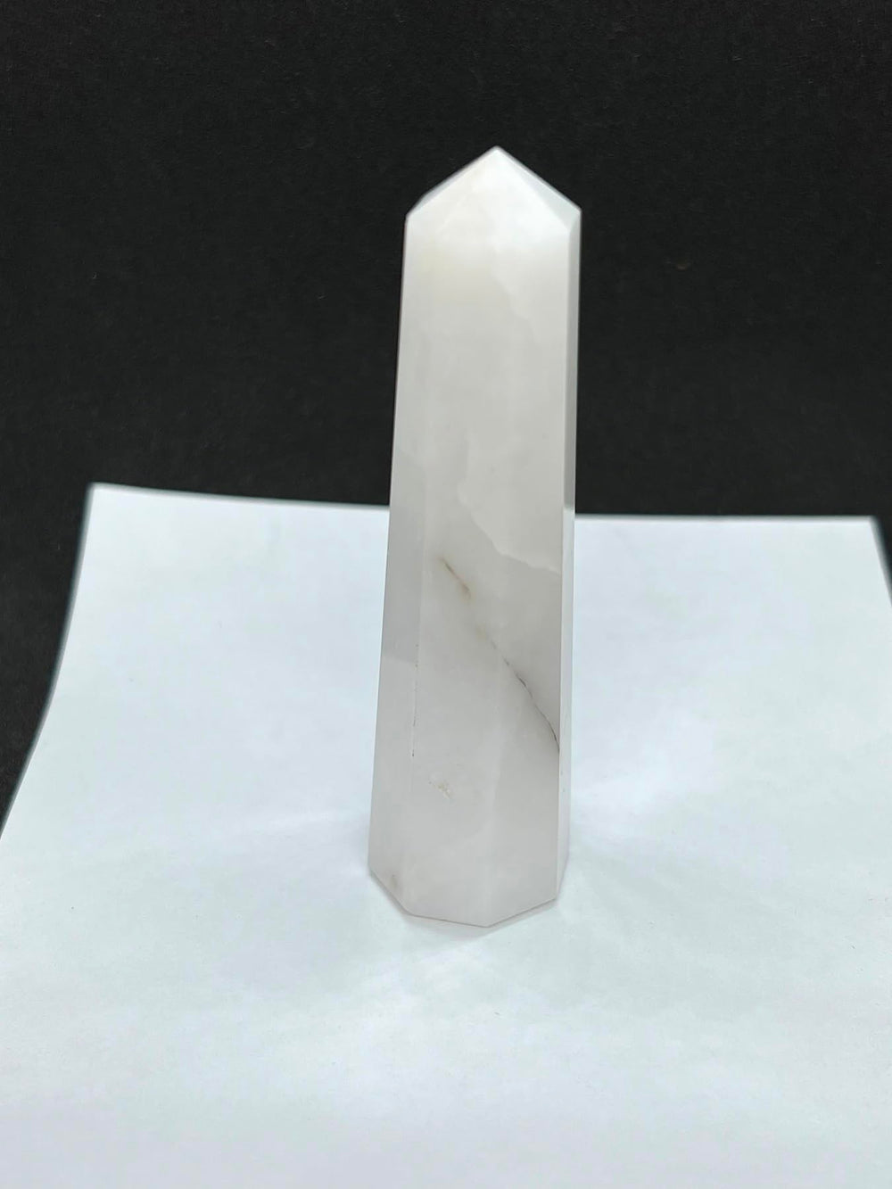WholesaleGemShop Snow Quartz Obelisk 70mm packaging view showing safe transport