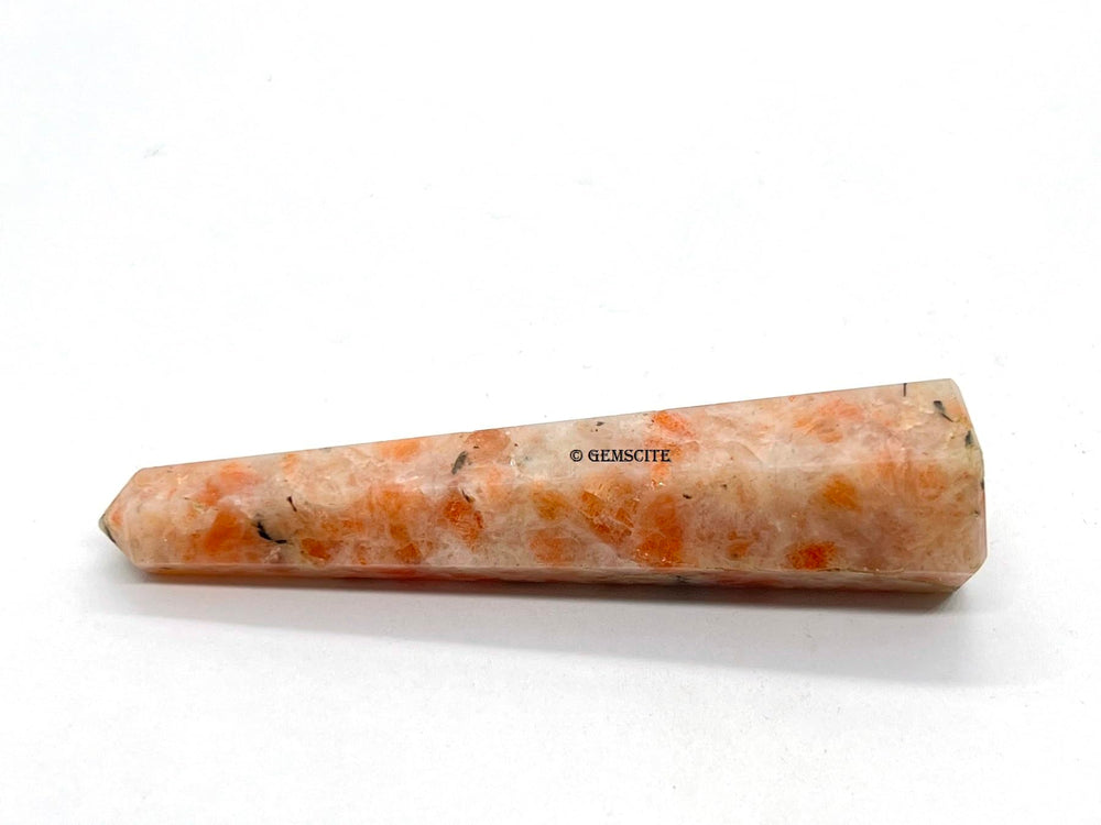 Wholesale Gem Shop sunstone obelisk texture highlights earthy color variations.