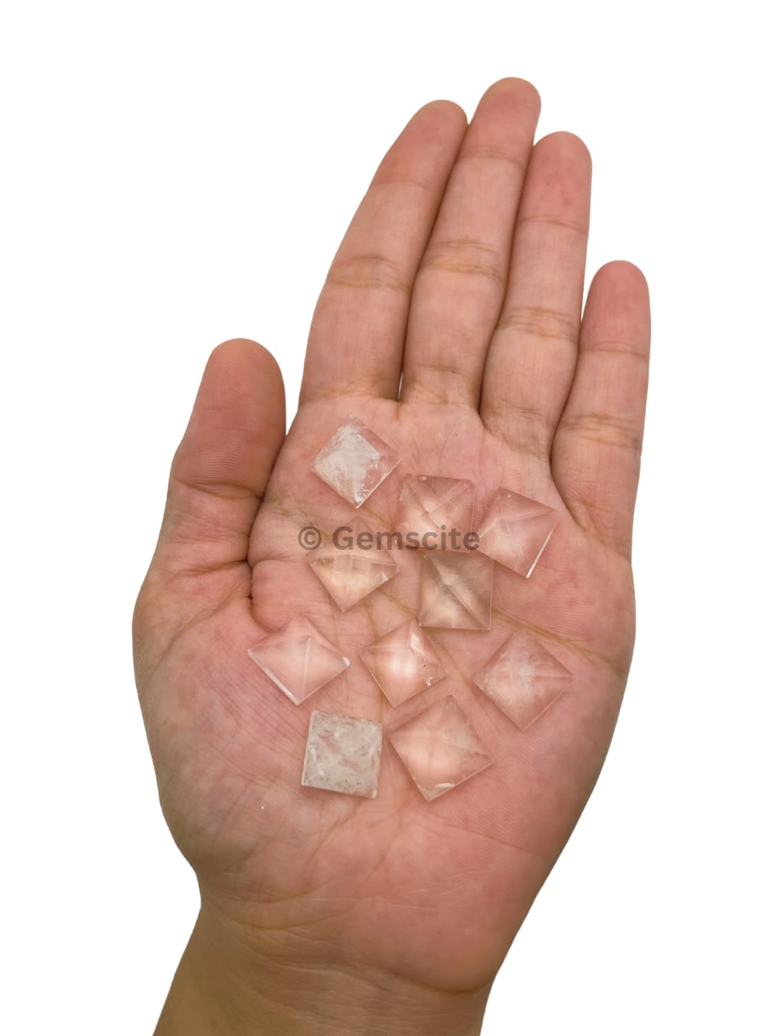 Wholesale Gem Shop transparent quartz pyramid geometry 12x16mm for display and gifting.