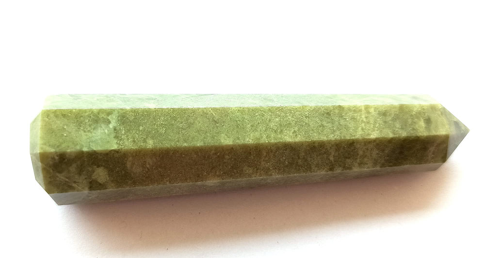 Wholesale Gem Shop Vasonite natural polish reveals carved detail for display and balance.