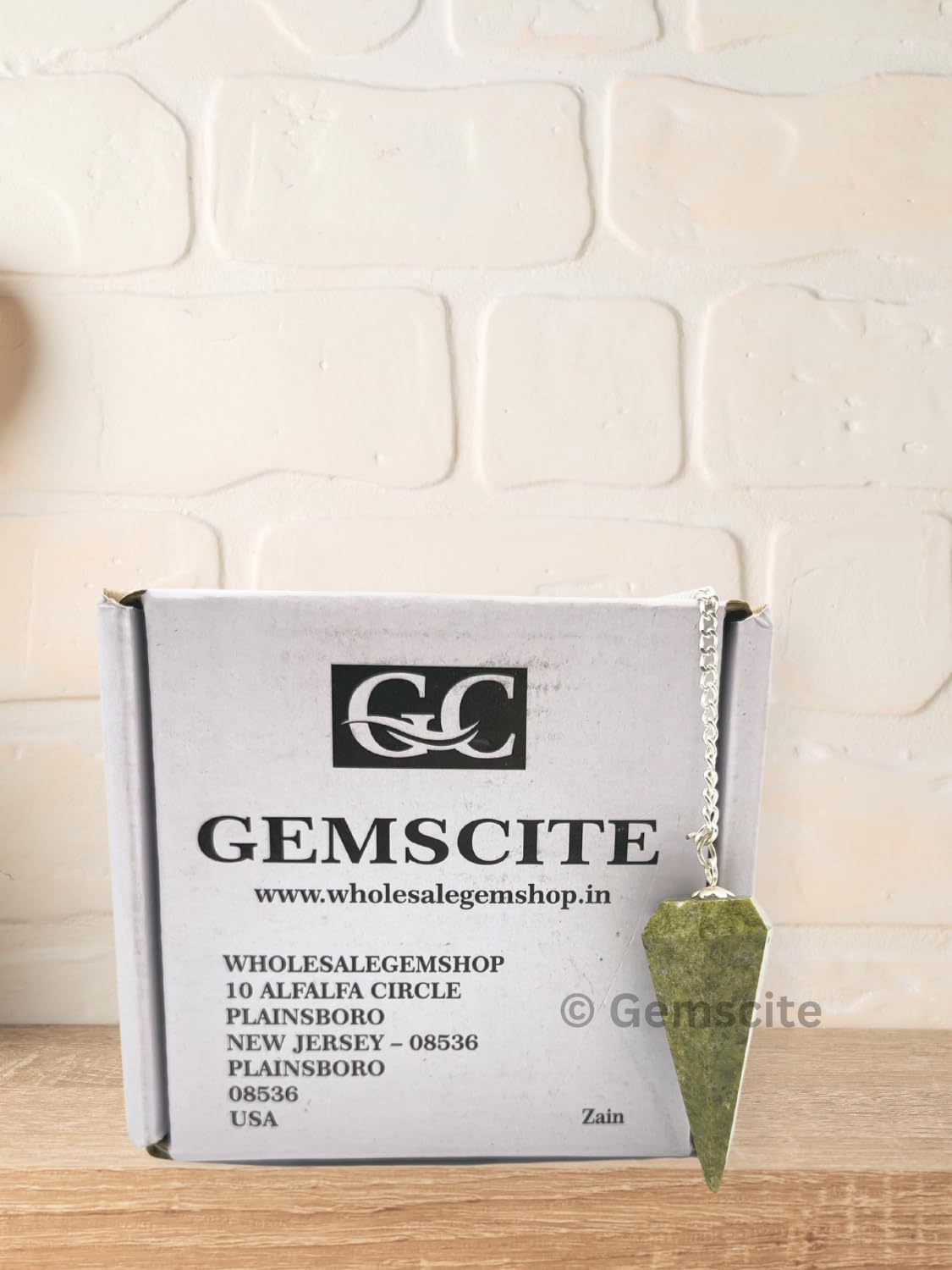 Desk setting with Vesuvianite pendulum from Wholesale Gem Shop for daily rituals