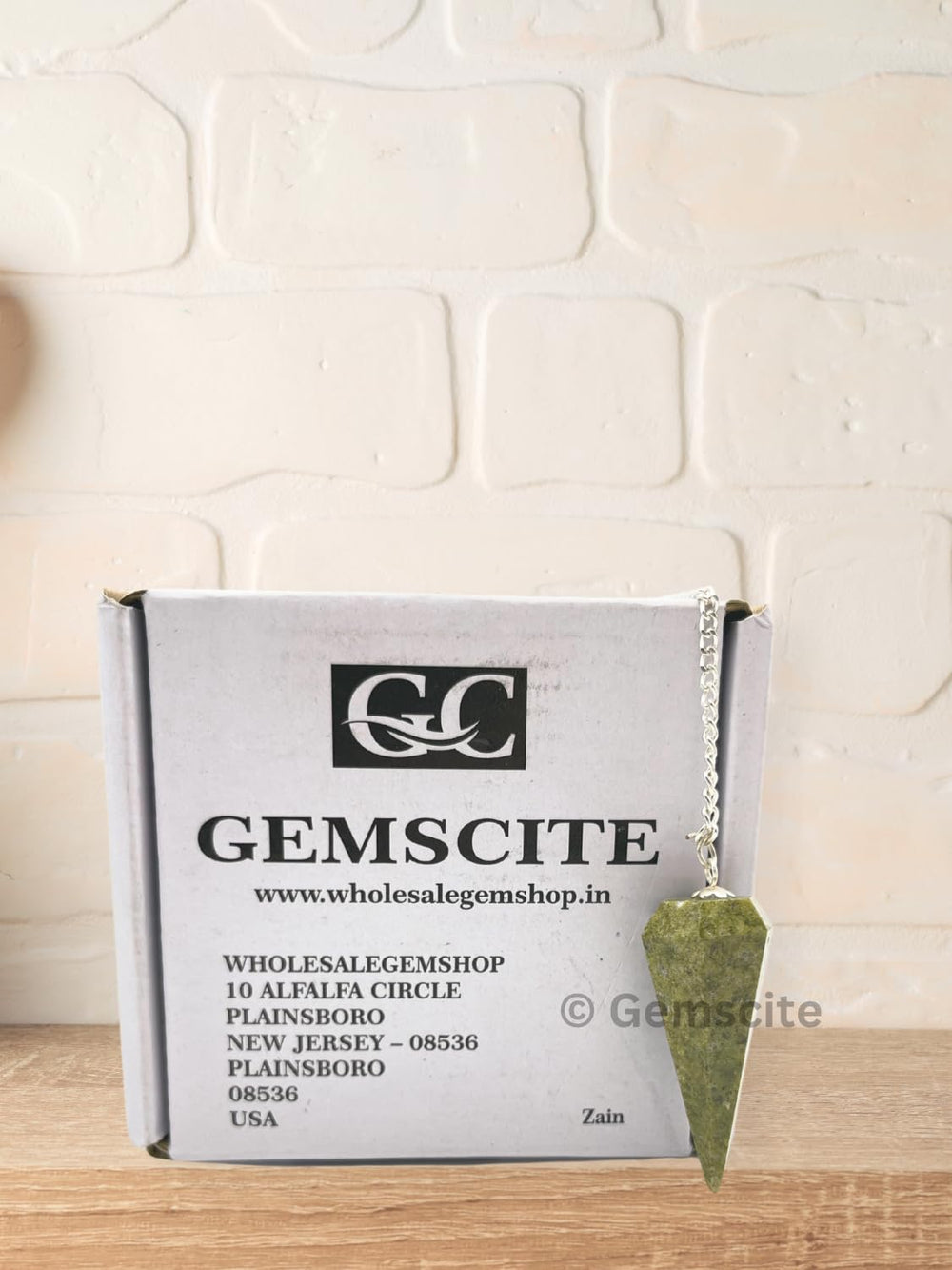 Desk setting with Vesuvianite pendulum from Wholesale Gem Shop for daily rituals