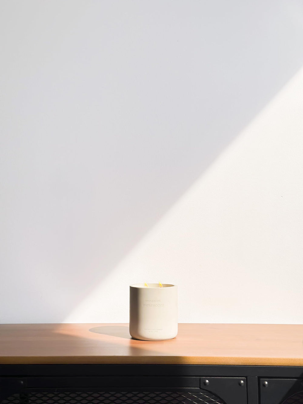 Coconut wax glow demonstrates clean burn for a calm space.