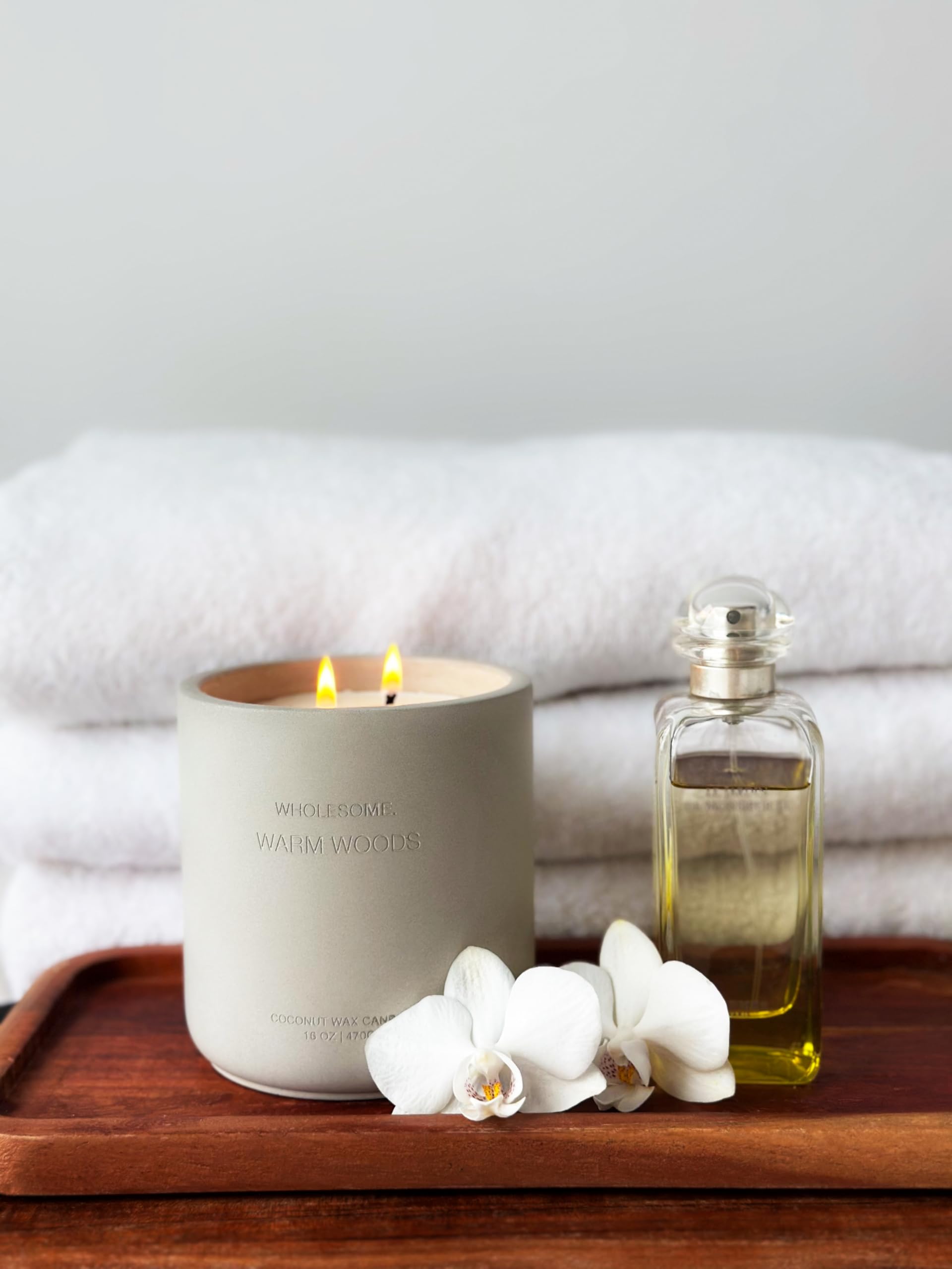 Hand-poured texture on Wholesome Warm Woods candle adds artisanal charm.