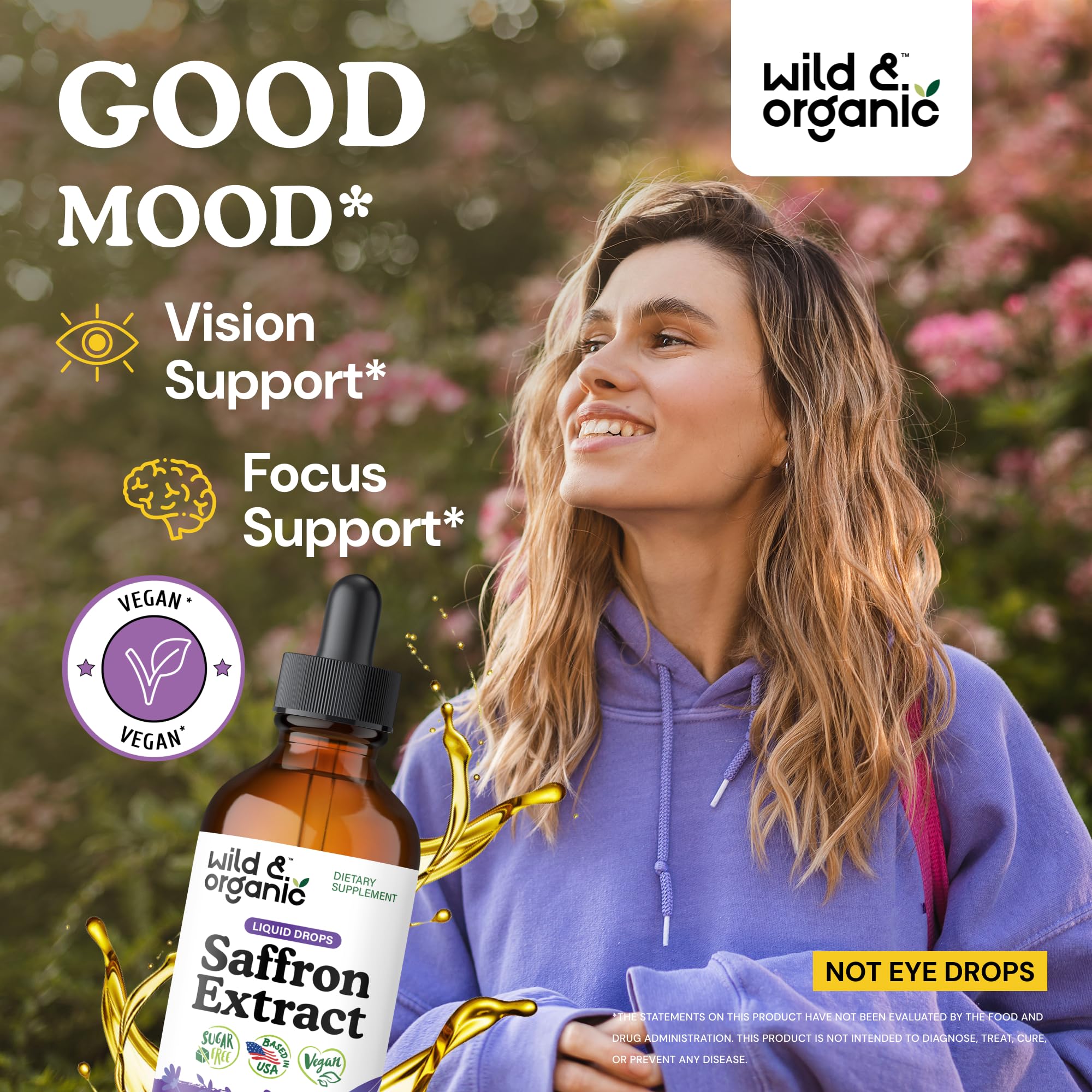 Wild & Organic saffron supplement drops application demonstrates convenient dosing for focus and calm moments.