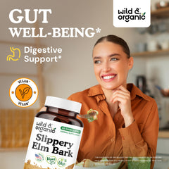 Closeup of Wild & Organic slippery elm capsules highlighting vegan coating.