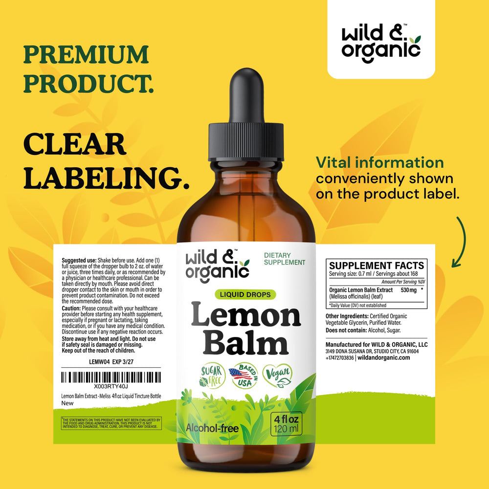 Wild & Organic Lemon Balm Tincture with glass and spoon conveys easy dosing.