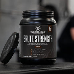 Wilderness Athlete Brute Strength scoop dispensing powder for quick protein and creatine intake