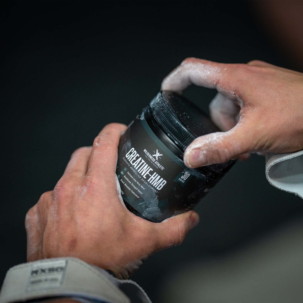 Scoop with Wilderness Athlete Creatine HMB powder for precise dosing