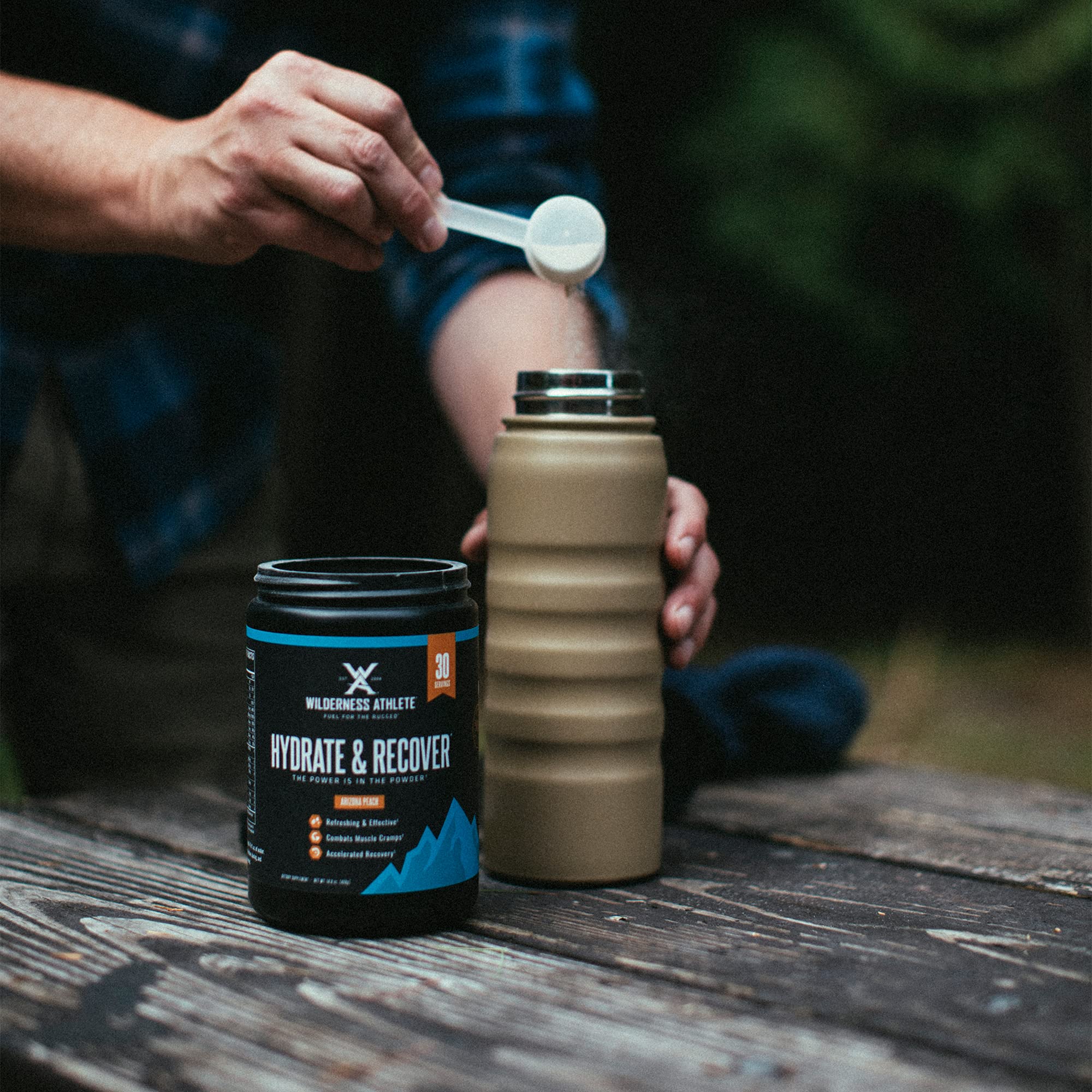 Wilderness Athlete Hydrate & Recover BCAAs close-up for muscle recovery support.