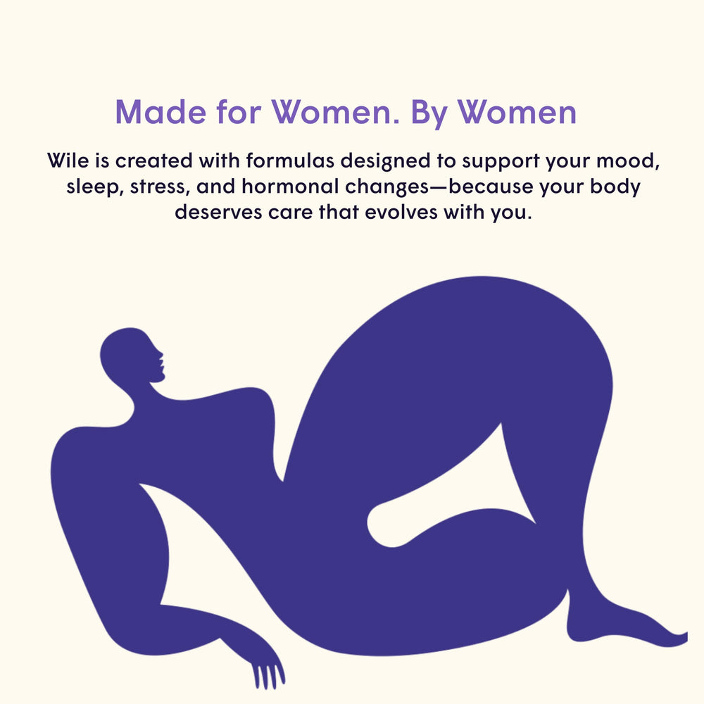 WILE Deep Sleep Gummies pieces arranged on a wooden surface.