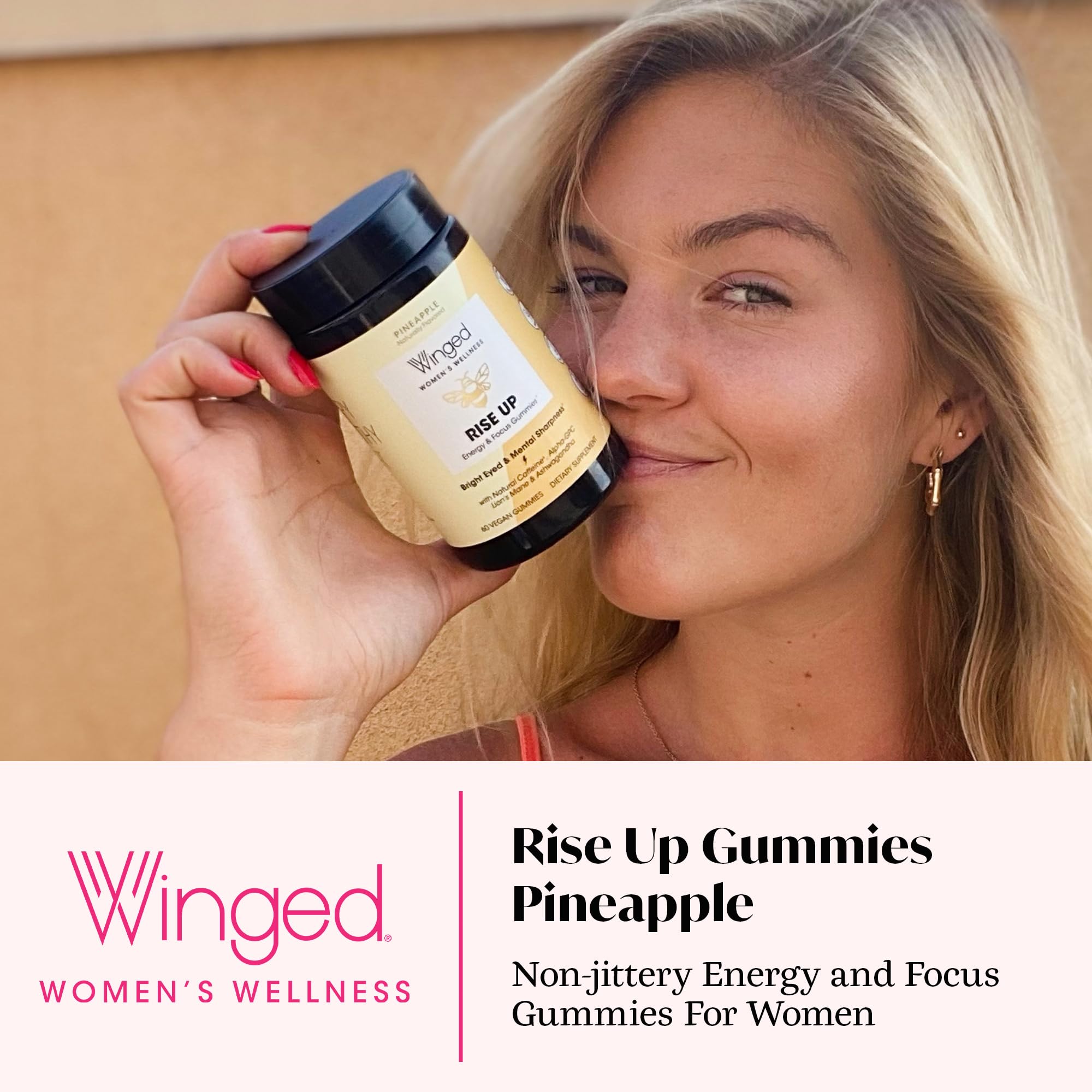 Closeup of Winged Wellness Rise Up gummies with caffeine and nootropics for alertness